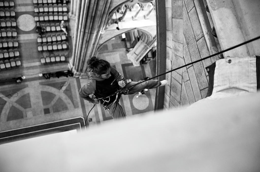 Ishita Raina from Yskynna Vertical Dance Company descending from Truro Cathedrals spire