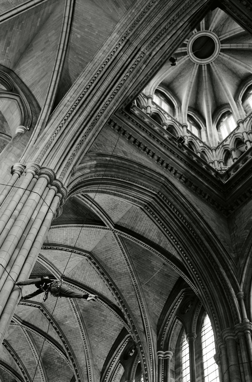 Ishita Raina from Yskynna Vertical Dance Company warming up at rehearsal in Truro Cathedral