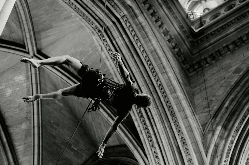 David Greeves from Yskynna Vertical Dance Company rehearsing in Truro Cathedral