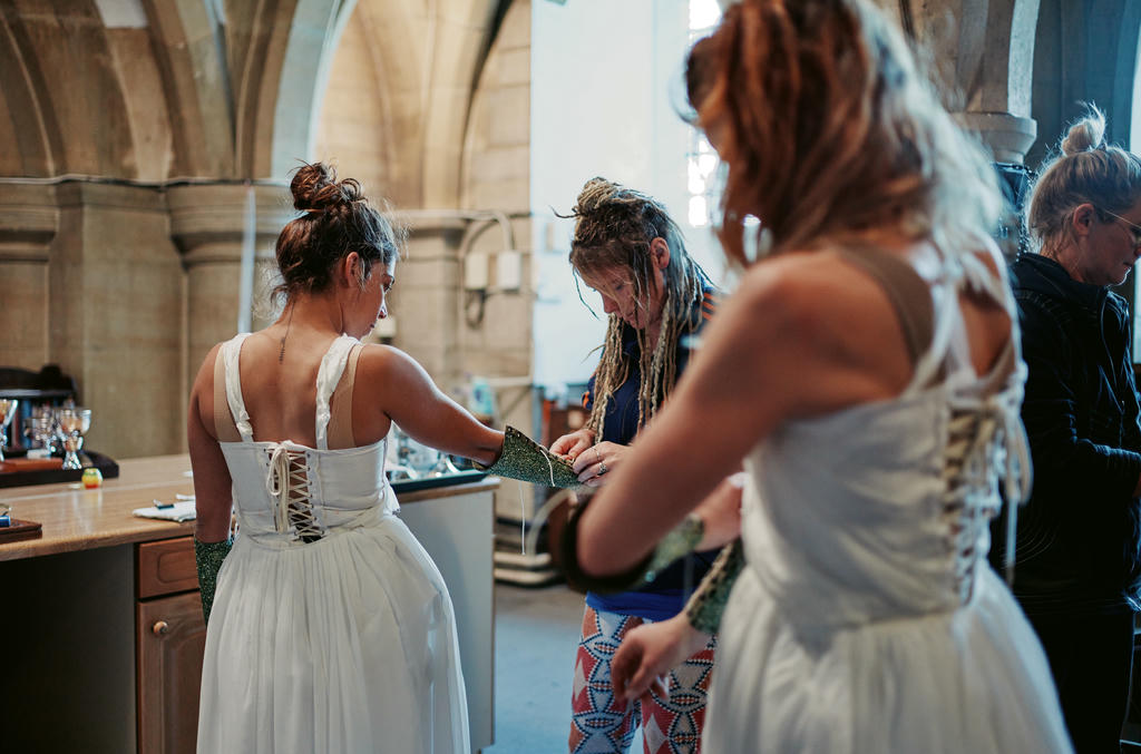 Ishita Raina and Georgie Barnett preparing for a dress rehearsal underneath Truro Cathedral